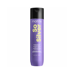 Purple Matrix So Silver shampoo bottle with black cap on a purple background.