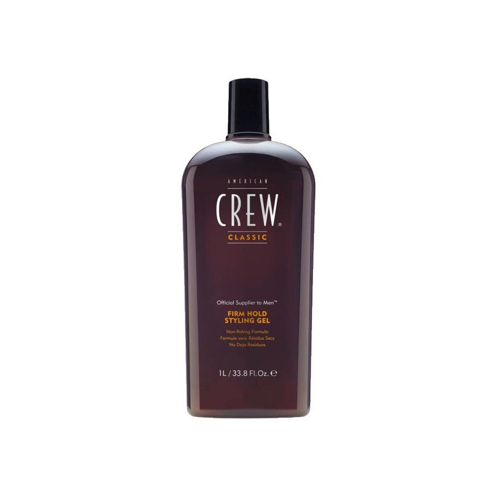 A bottle of American Crew Firm Hold Styling Gel in brown color with a black cap. The label indicates the product is a hair styling gel with a firm hold and enhanced shine, 1000ml size.