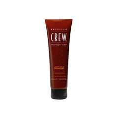 A tube of American Crew Light Hold Styling Gel with a red label, indicating the product is designed for men's hair care.