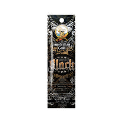 Australian Gold Sinfully Black sachet for indoor tanning, featuring a black and gold color scheme with decorative fonts and an image of a sun.