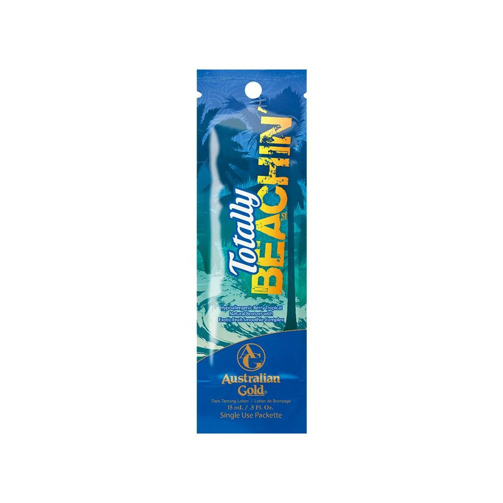 Australian Gold Totally Beachin' sachet of tanning lotion with a blue and green packaging, featuring text and branding.