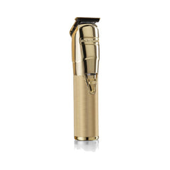 Gold Super Motor Trimmer on a white background. 